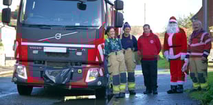 Firefighters turn Santa for a day to help local families