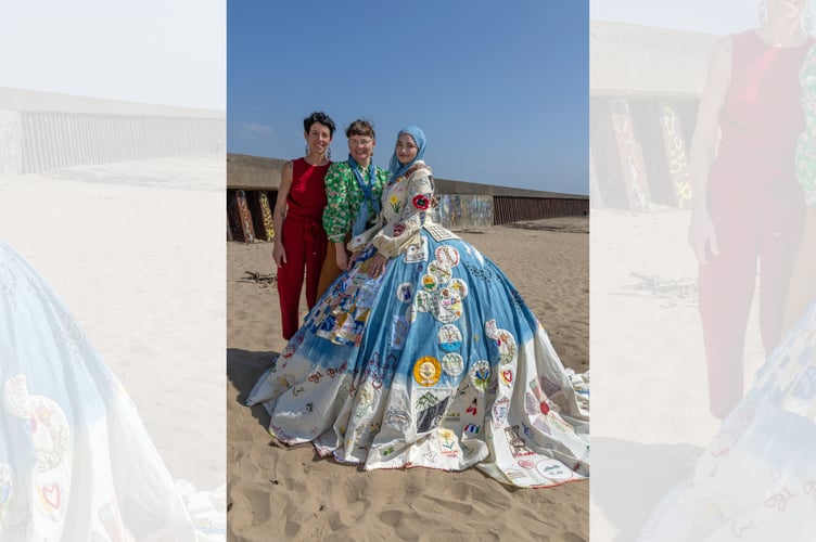 Menna Buss (centre) with Kirstie Macloed and Fataya Bitar who is modelling the Calico Dress Cymru