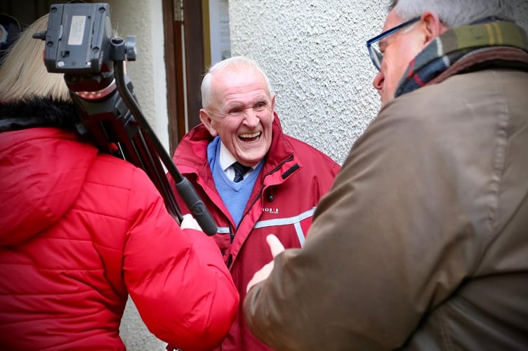 Bryan George shares a joke with Cllr William Powell and Hannah Thomas of ITV Wales