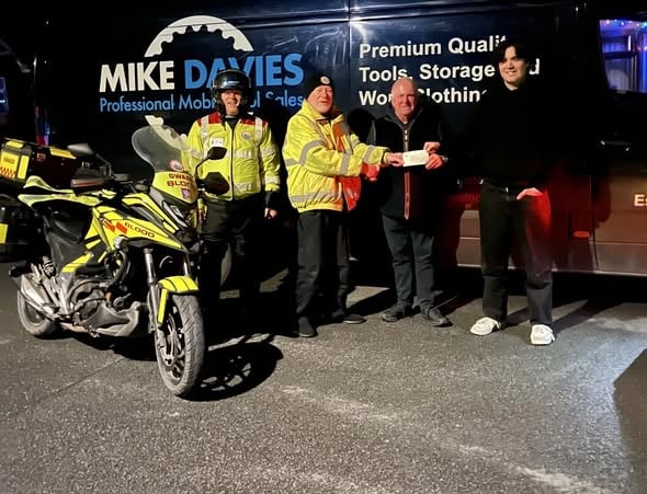 Llandrindod business raises nearly £3,000 for Blood Bikes Wales