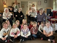 Year 2 pupils bring Christmas cheer to nursing home