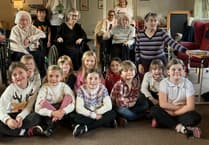 Year 2 pupils bring Christmas cheer to Brookside Nursing Home