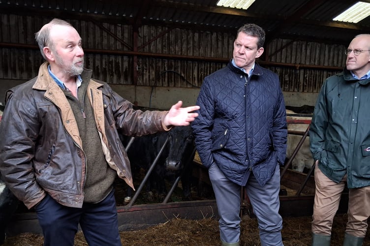 FUW regional vice-president Alun Owen (left), Rhun ap Iorwerth MS and Llyr Gruffydd MS