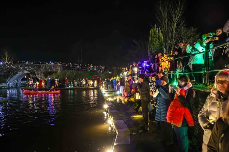 The canal was illuminated as the lantern parade arrived