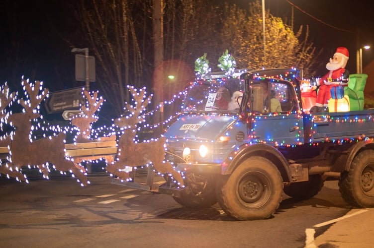 Darren and Deri with their prize-winning illuminated tractor