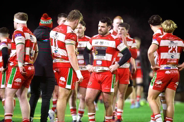 Dejected Llandovery players after their defeat to Ebbw Vale