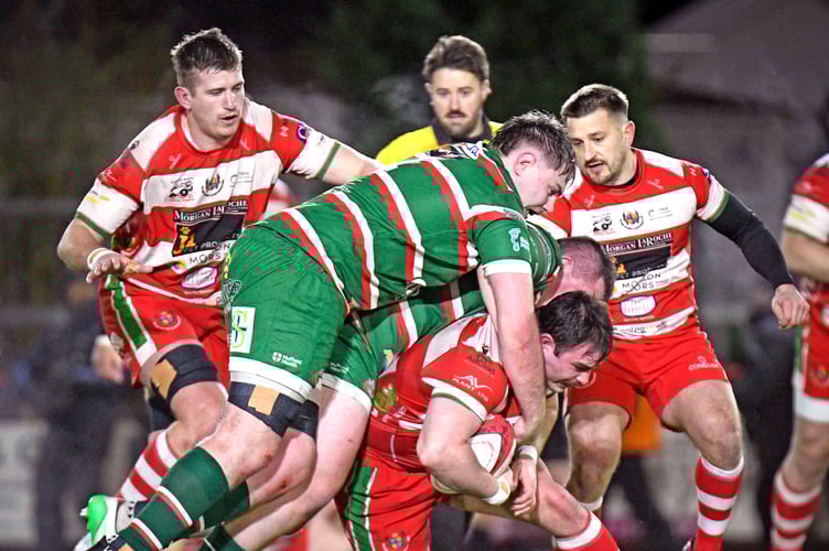 Cam Lewis is tackled by Ebbw Vale