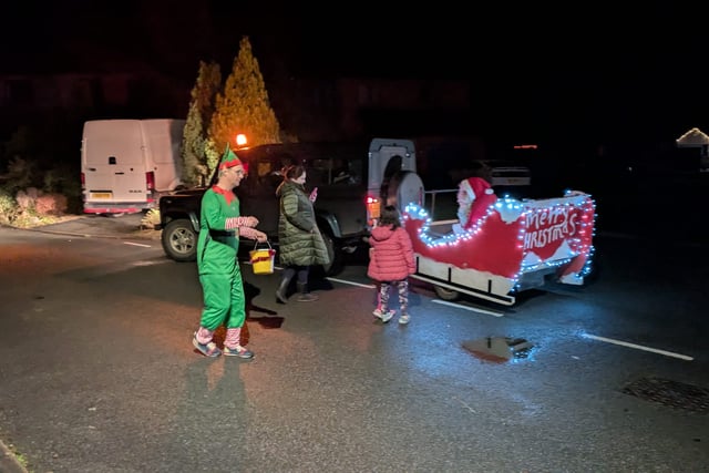 Hundreds raised during Father Christmas village visits