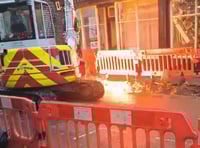 Workers strike cable causing massive sparks on High Street