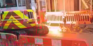 Workers strike cable causing massive sparks on High Street