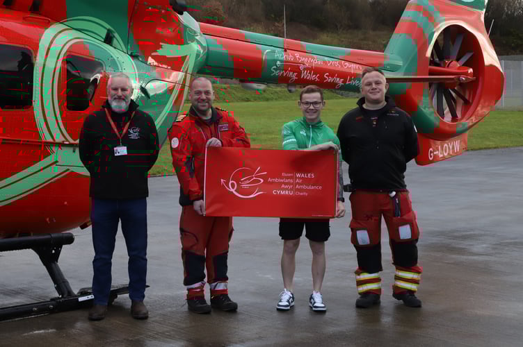 Steffan Lloyd-Castle (in green) will tackle a 416-mile charity ride for Wales Air Ambulance