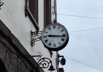 Historic Brecon clock returns following repairs