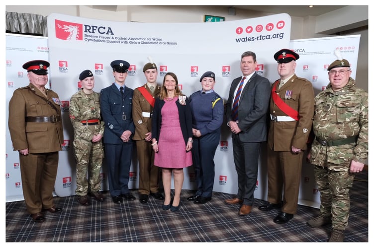 Left to right: Captain Paul Jones, Cadet Staff Sergeant Megan Williams, Cadet Warrant Office Max Morgan, Cadet Company Sergeant Major Harry Agnew, the Lord- Lieutenant of Powys Mrs Tia Jones, Cadet Flight Sergeant Lexie Young, Warrant Officer Mark Collacott, Warrant Officer Christopher Thompson, and Staff Sergeant Ian Corstorphine