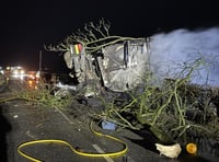 Lorry overturns and catches fire on Powys A-road