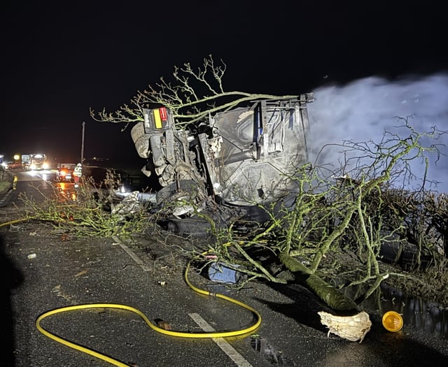 Lorry overturns and catches fire on Powys A-road