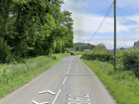 One taken to hospital as tractor and car collide near Powys town
