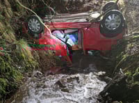 Trapped driver rescued after car overturns into stream near Talgarth