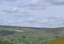 What are the positives of having a massive wind turbine farm at Nant Mithil?