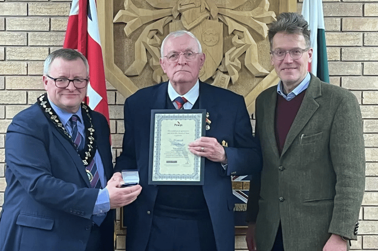 Hamish Stonebridge receiving his award from Cllr Powell. He was nominated by Cllr Jake Berriman