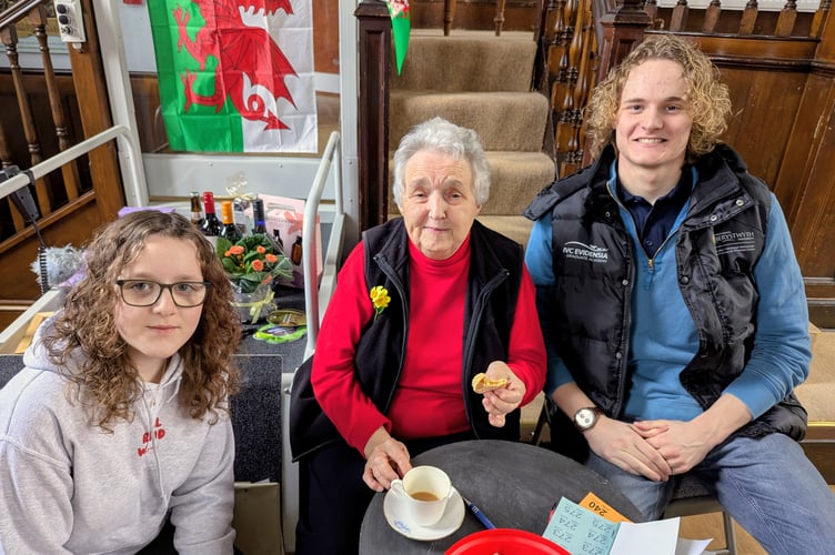 Susan Price with two of her grandchildren, Ioan and Alis Mabbutt, at the St David's Day coffee morning in Llanwrtyd