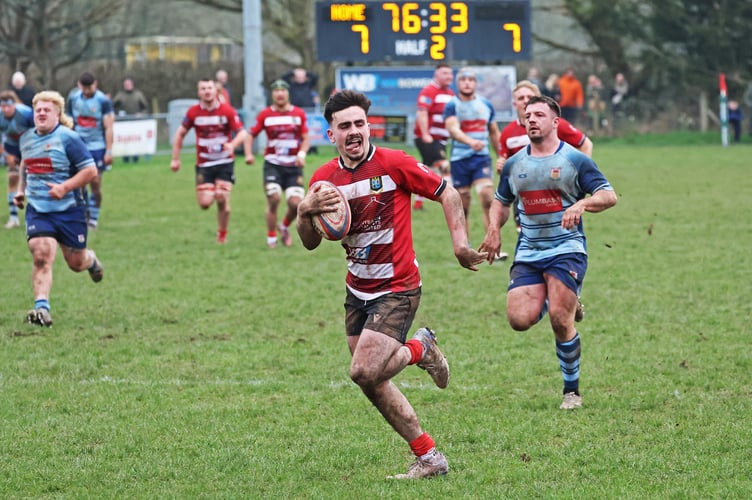 Brecon's Joel Price breaks away to score the winning try