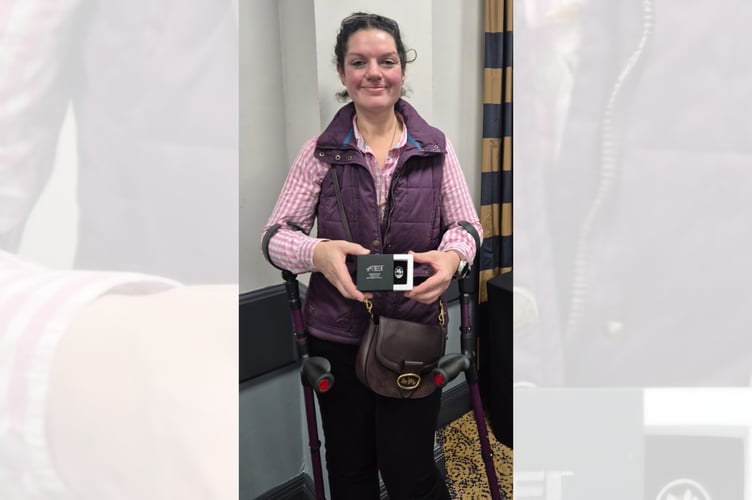 Emily with her Silver Badge of Honour from the Fédération Équestre Internationale