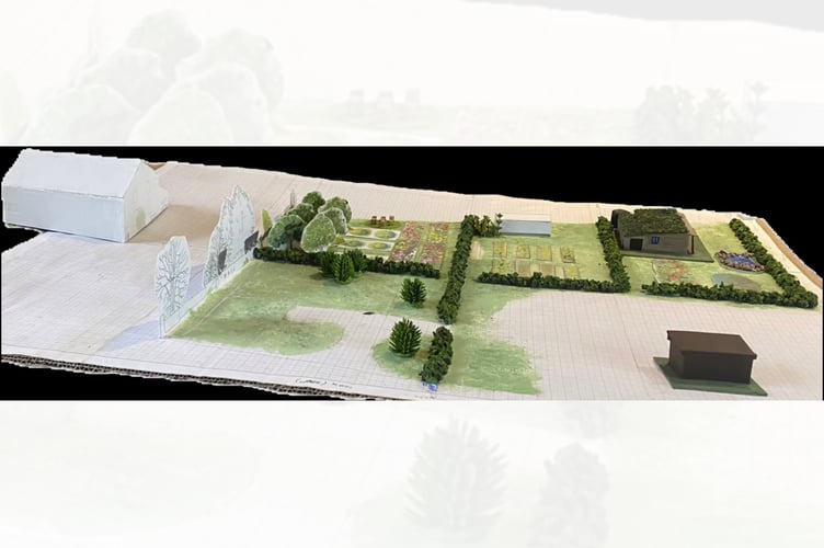 Artist’s impression of the proposed One Planet Development, with Maes-y-Berllan Chapel on the left