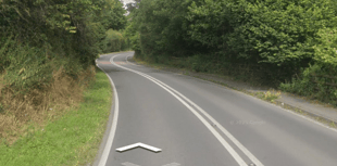 Car and cyclist collide on Powys A-road
