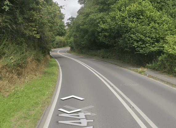 Car and cyclist collide on Powys A-road