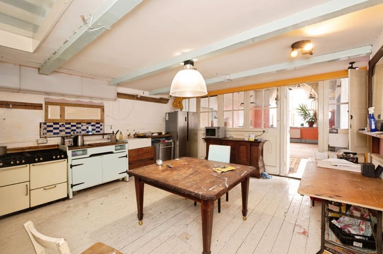 The building is designated Grade II-listed