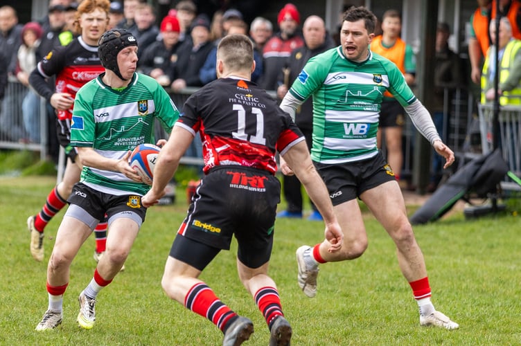 Llewelyn Brown cuts open the Llangennech defence to set up Brecon's second try