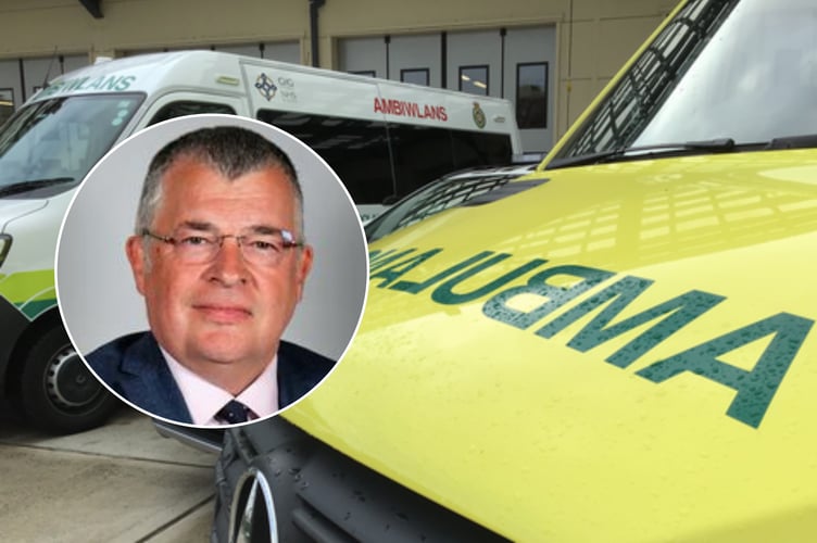 Cllr Iain McIntosh says the recruitment freeze leaves paramedic graduates in Powys facing uncertainty