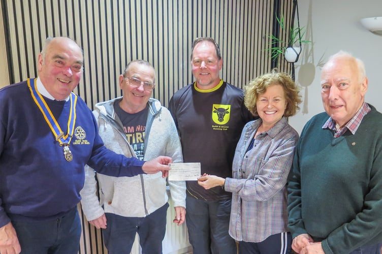 Aquathlon organising committee members Liam Daly, Adam Johnstone and Helen Tuite, Rotary president Hugh Garner, and Rotarian Doug Wellstead