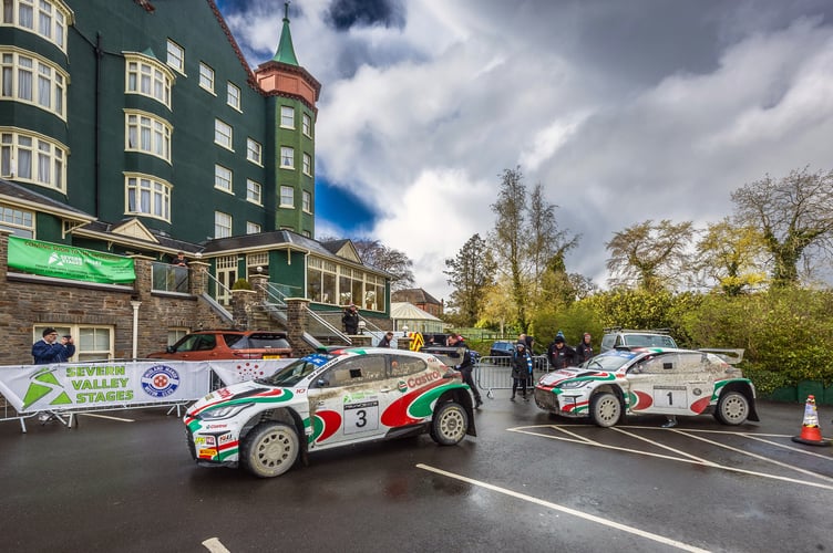 Under the watchful eye of the Metropole Hotel, the winning MEM team line up to celebrate taking the top two positions (Image: Mark Griffin)