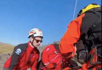 Rescue team assist with airlift as walker suffers lower leg injuries