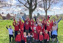 School taken off improvement list after Estyn praise