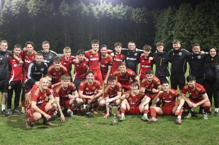 Newtown celebrate winning the Central Wales Cup after a 3-0 victory over Caersws at Rhayader’s Weirglodd.