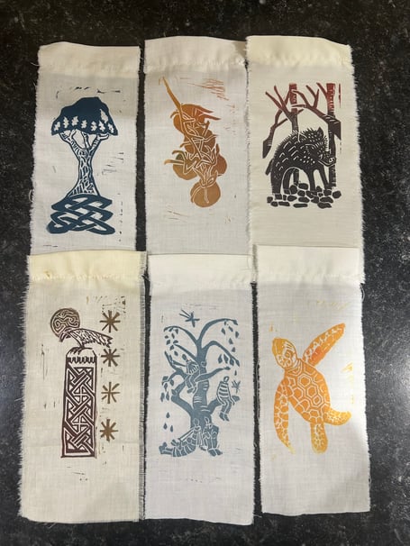 Festival tickets designed by local artist Amanda Rose, made from recycled scrap materials and created to double as reusable bookmarks