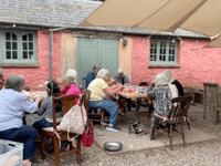 Sun and stories in Penpont for refugee visit