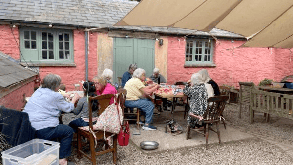 Sun and stories in Penpont for refugee visit