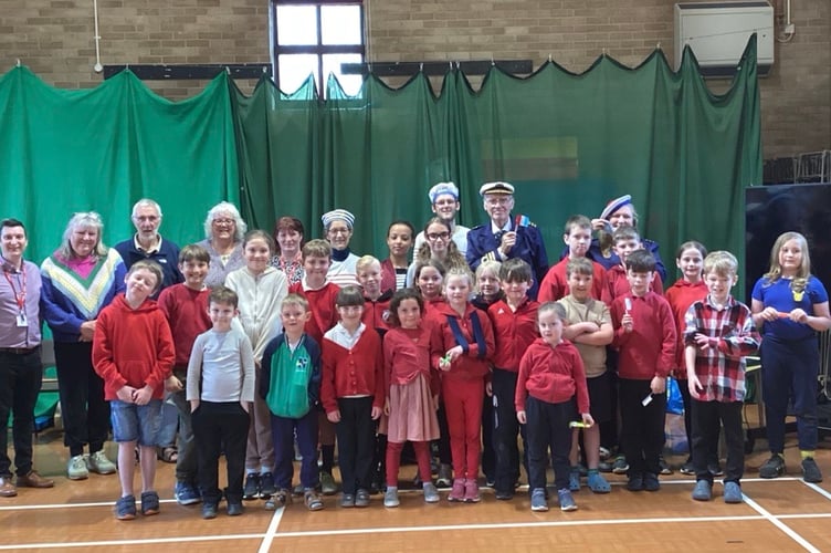 Pupils and former headteachers of Ysgol Dôlafon celebrate twinning with friends from France