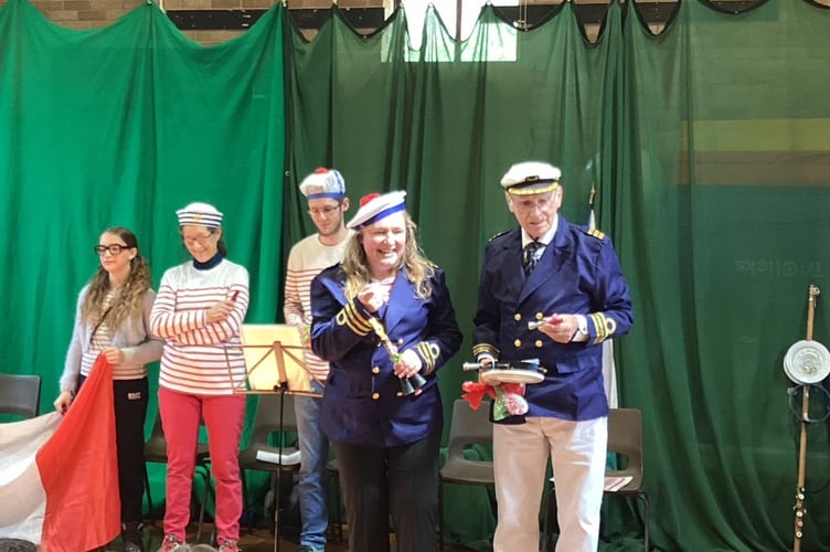 Friends from France entertain pupils with singing and music