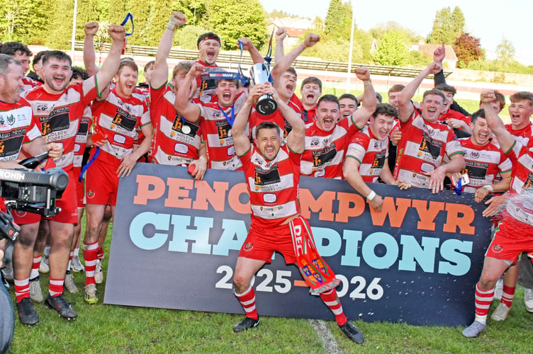 Lee Rees lifts the SRC trophy with the Llandovery team