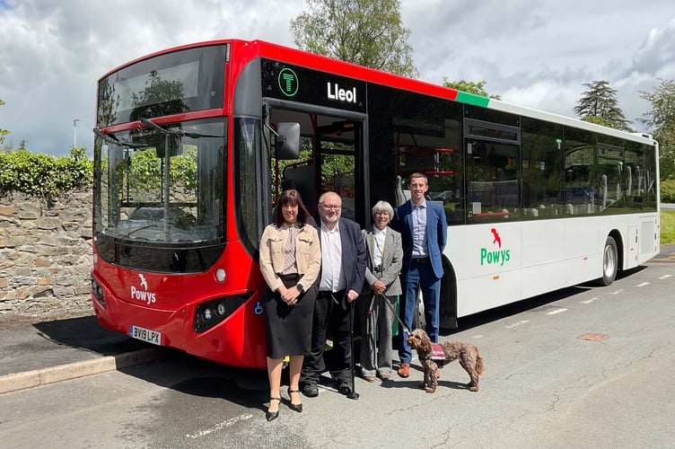 Newly refurbished buses have arrived in Powys as part of a 15-vehicle upgrade programme. Pictured at County Hall, Llandrindod Wells are (left to right): Emma Palmer, Chief Executive of Powys County Council, Barclay Davies of Bus Users UK, Cllr Jackie Charlton and Elliot Swallow of Transport for Wales