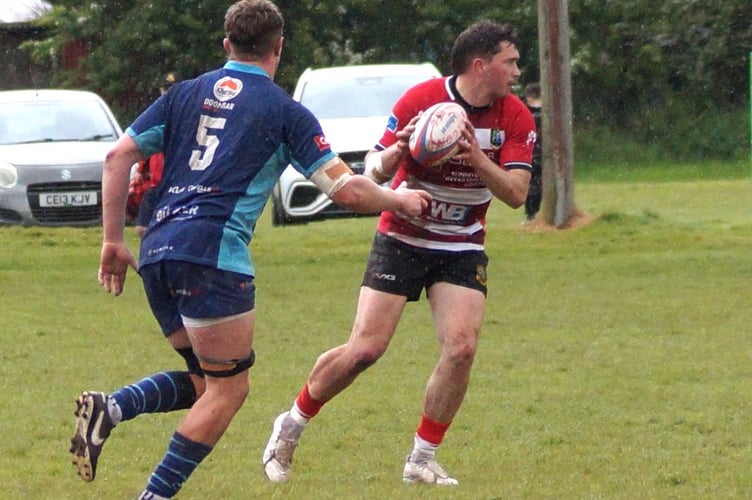 Brecon's Jake Newman runs out of defence
