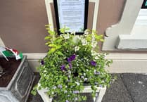 Old chairs turned into art in new Llandovery business trail
