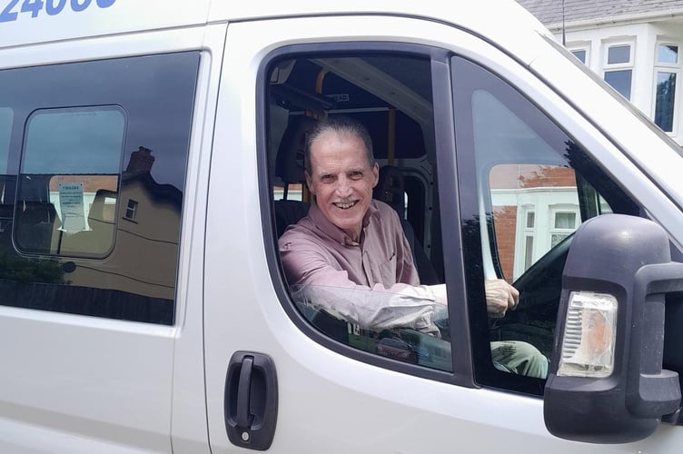 Retiring volunteer driver Peter in a Brecon & District Dial-a-Ride minibus
