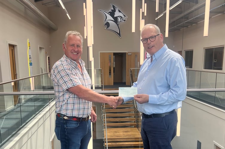 Radnor Hills CEO William Watkins with Knighton Show & Carnival Chair Paul Davies