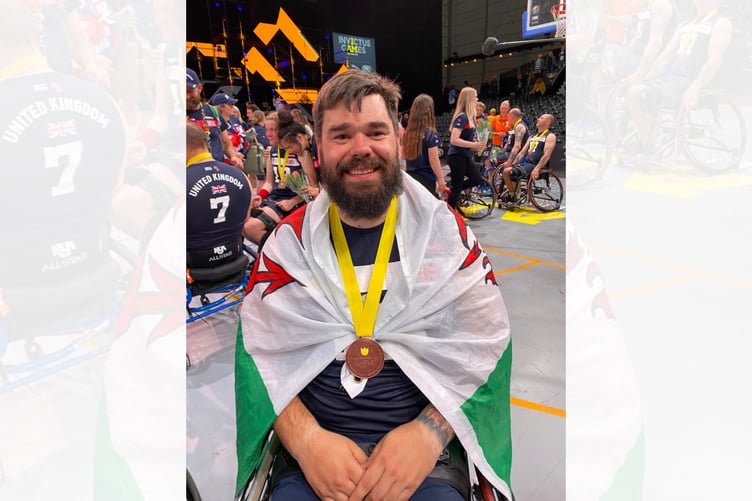 Brecon's Gwynne Walker with the bronze medal he won representing Team UK at the Invictus Games in The Hague in 2022