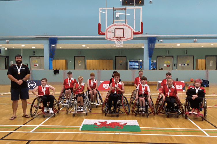 He coaches wheelchair basketball, drawing on his own experience to help players build resilience, teamwork and confidence on and off the court